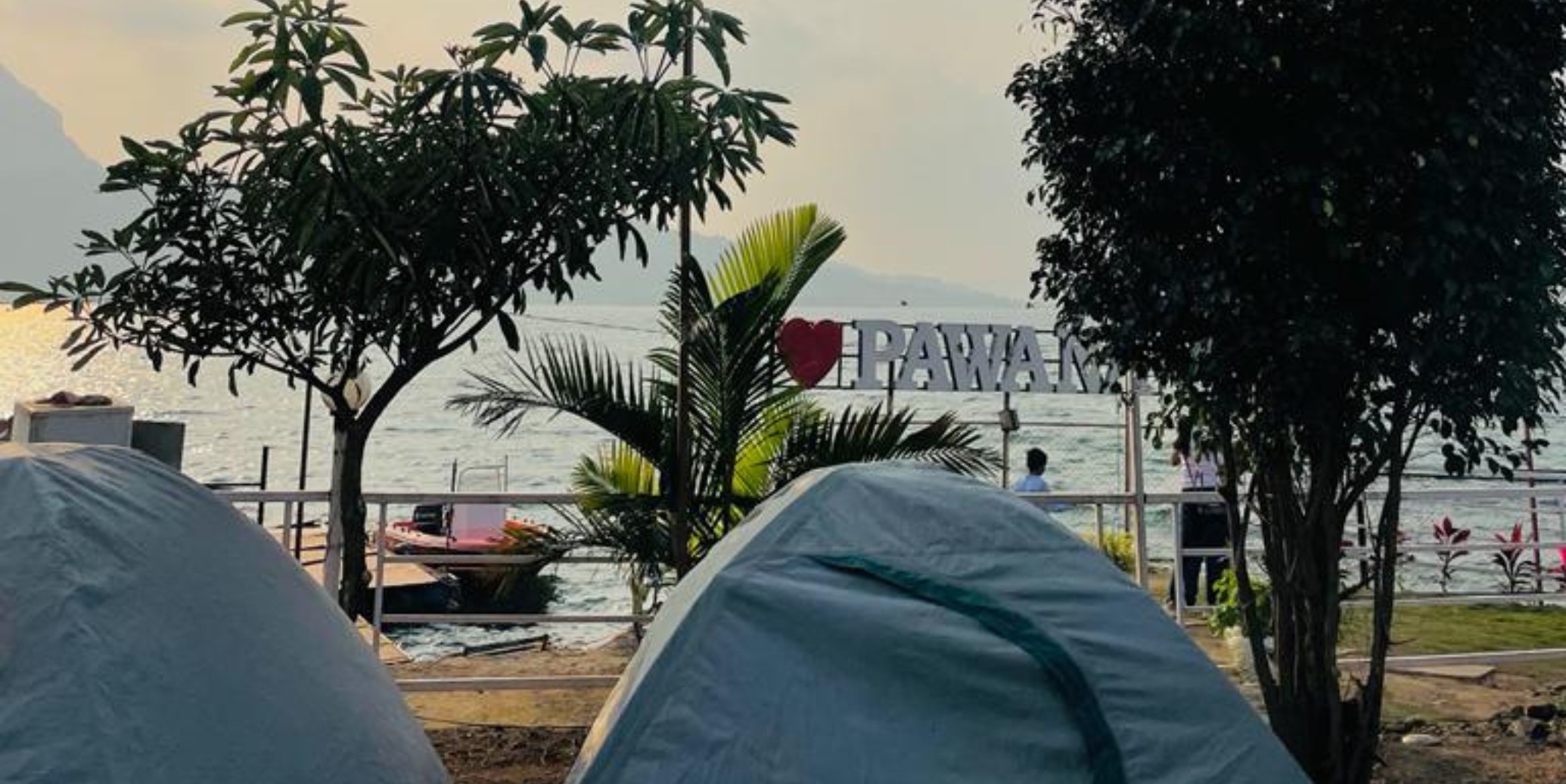 Pavana Lake scenic view with camping tents